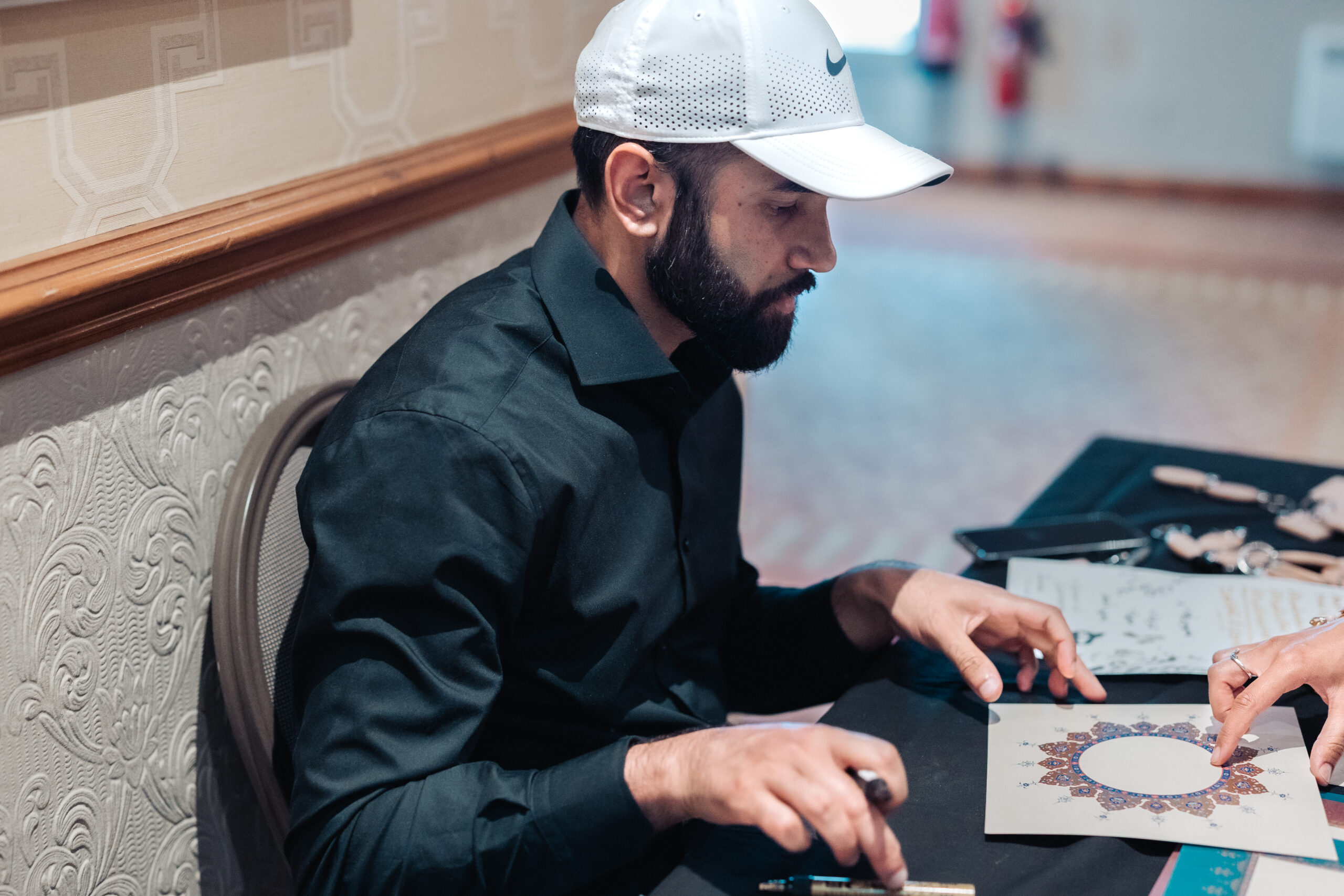 Live calligraphy at a wedding reception